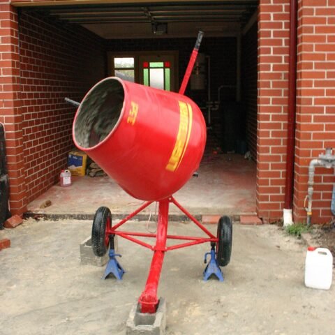 Tip-Up Cement Mixer 110V — illustrative hire catalogue image